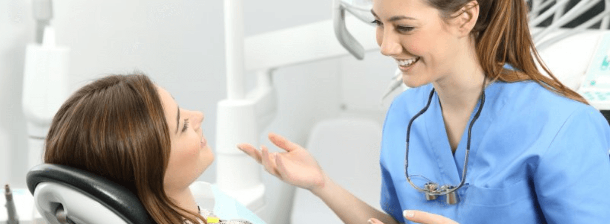 professional conversing with a patient